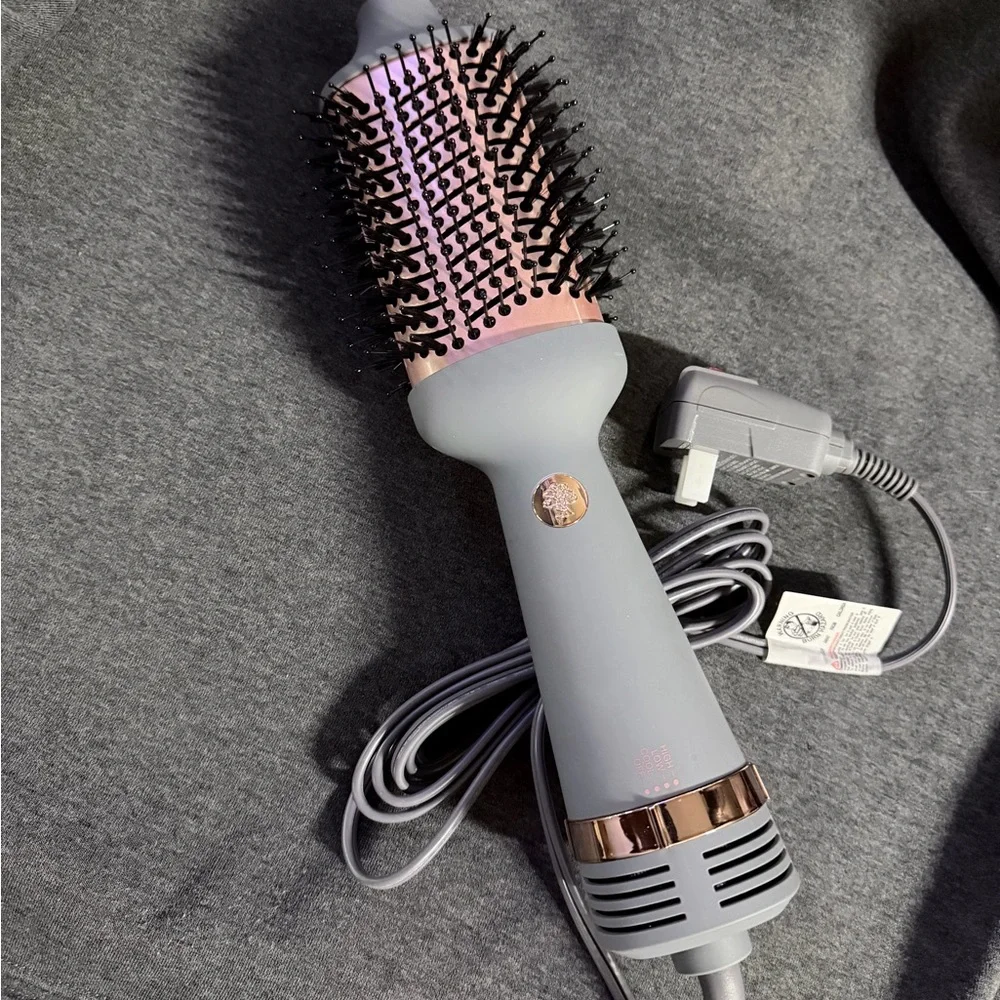 Sleek Pink and Gray Hair Dryer Brush